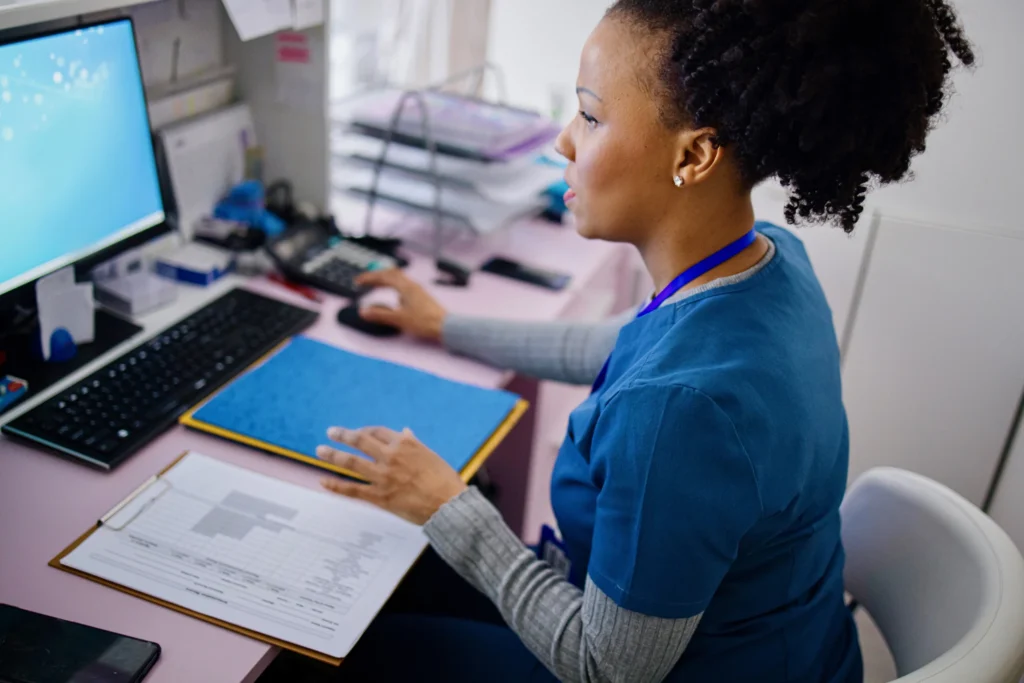 Nurse using a computer
